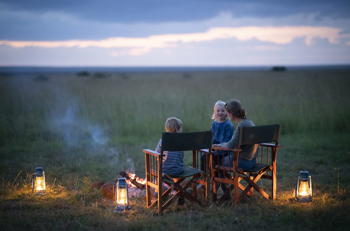 Loisaba Activities Family relaxing by the campfire